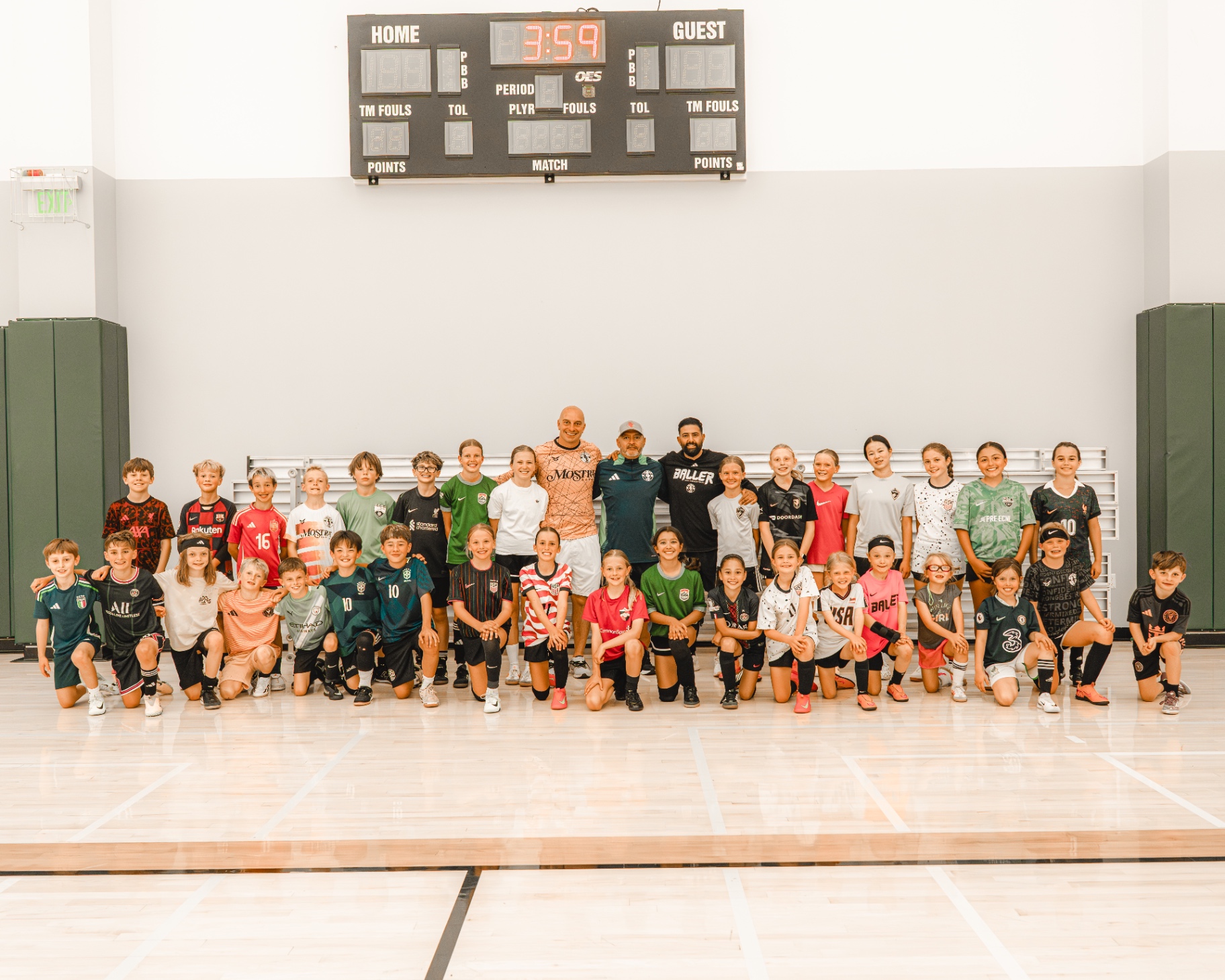 Group photo of players and coaches at Ballers Elite Colorado launch weekend